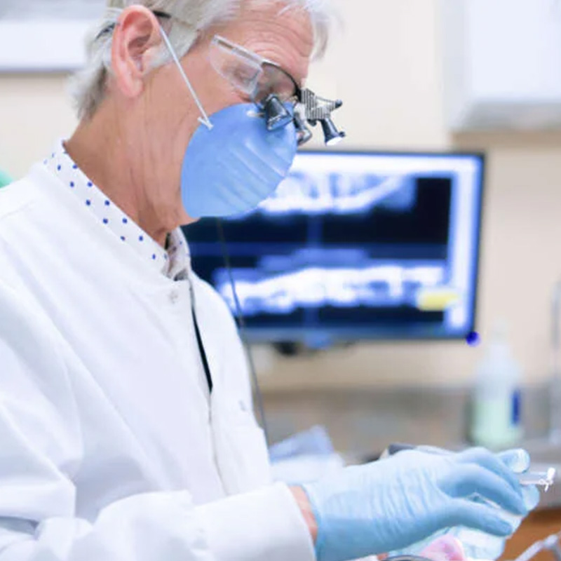 Dentist Timothy T Ryan Examing Patient